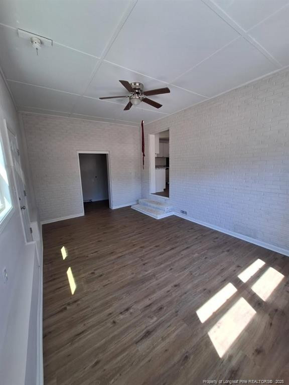 427 Jones Avenue Raeford, NC 28376 - Photo 7 of 15 a view of empty room with wooden floor and fan