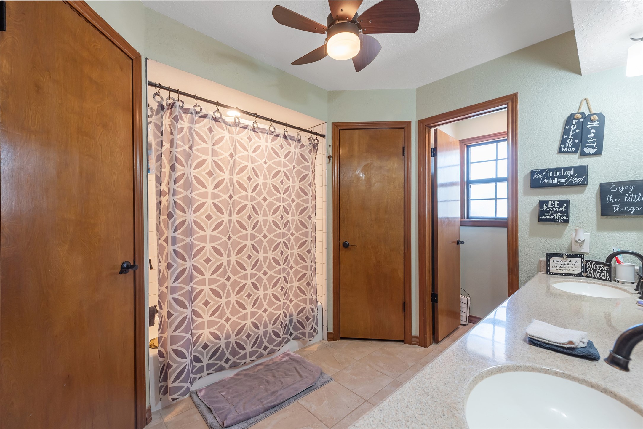 1014 Ginger Street Santa Fe, TX 77517 - Photo 19 of 50 a spacious bathroom with a granite countertop double vanity sink a mirror and shower