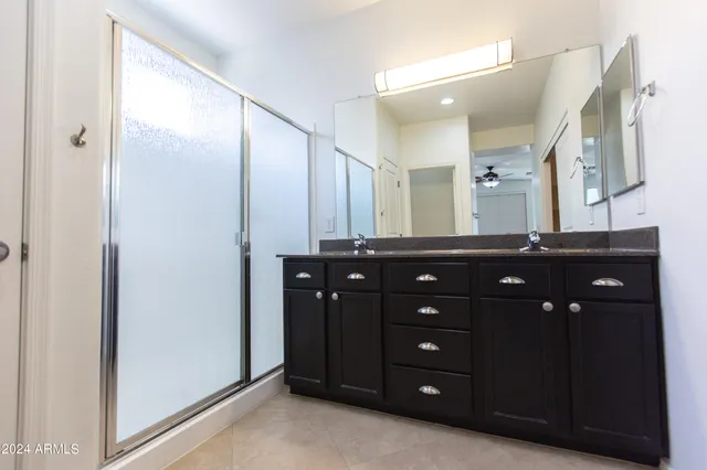 a a bathroom with a toilet and a sink