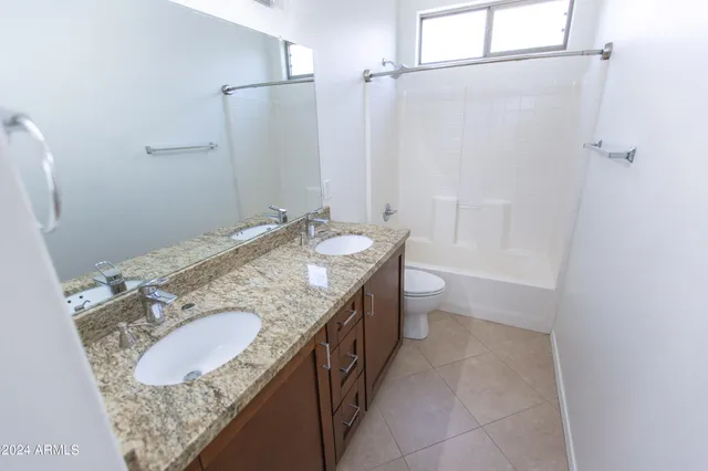 an empty room with mirror