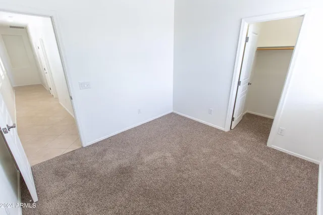a view of a utility room with closet