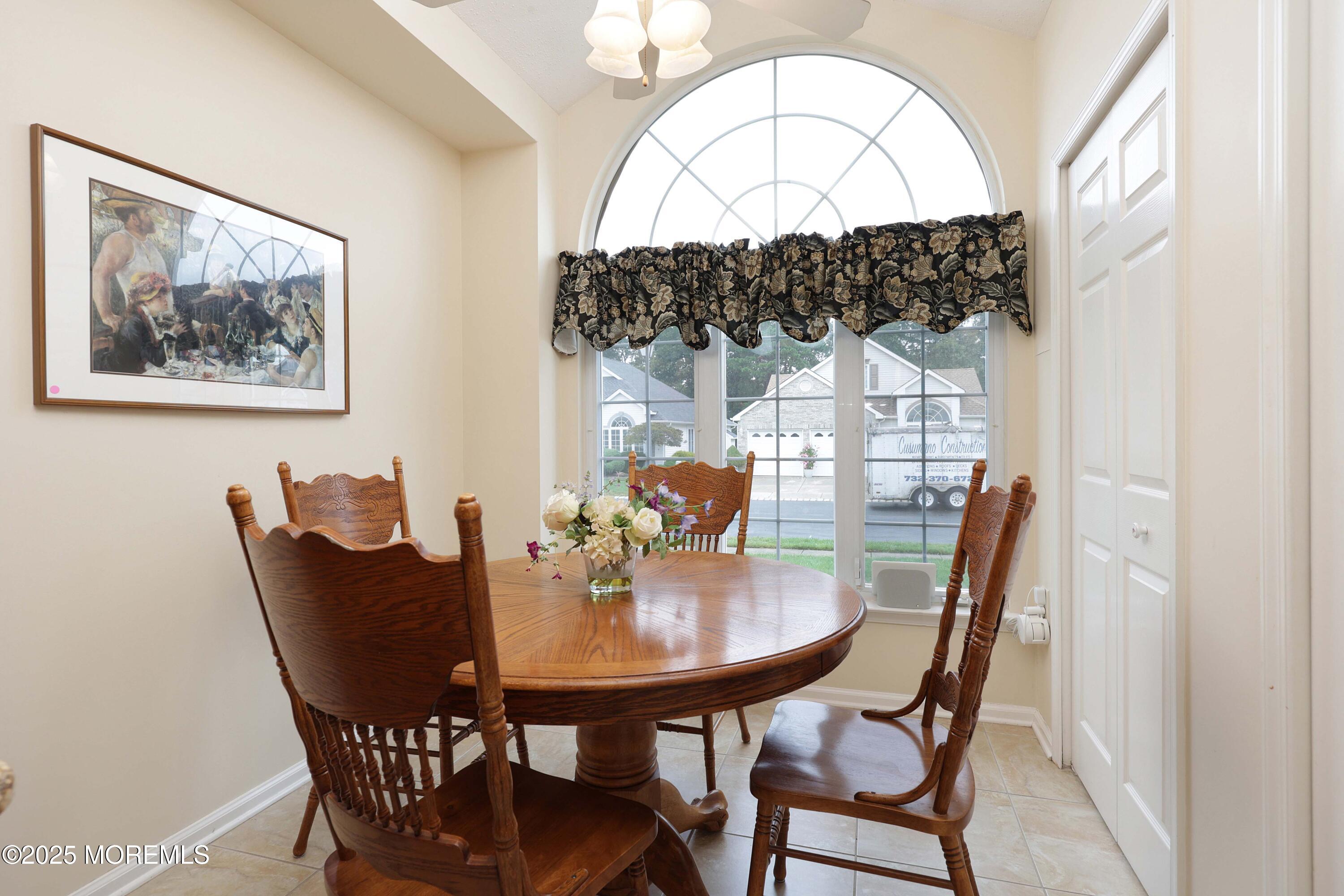 39 Dowing Lane Jackson, NJ 08527 - Photo 11 of 34 a view of a dining room with furniture and a chandelier