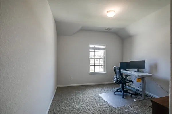 a view of a workspace with a window