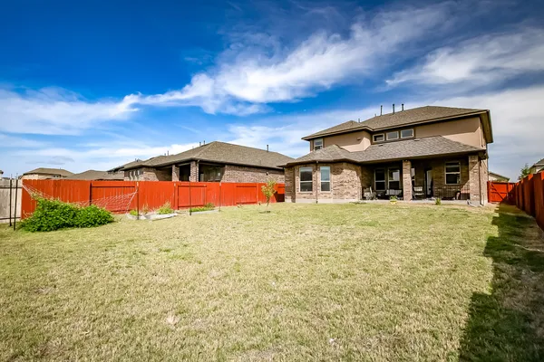 front view of a building with a yard