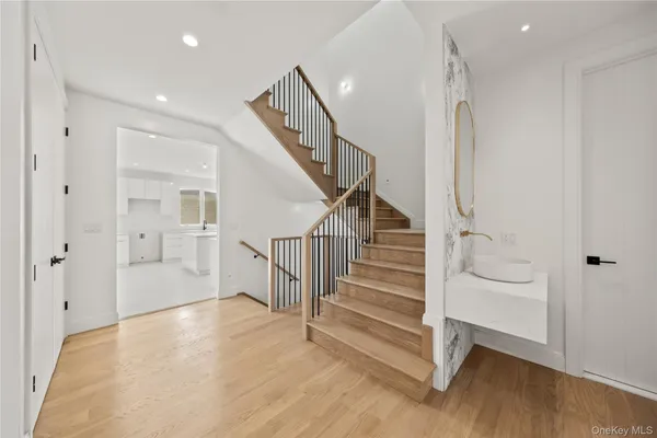 a view of entryway with wooden floor