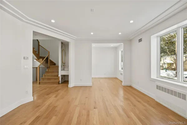 a view of entryway with wooden floor