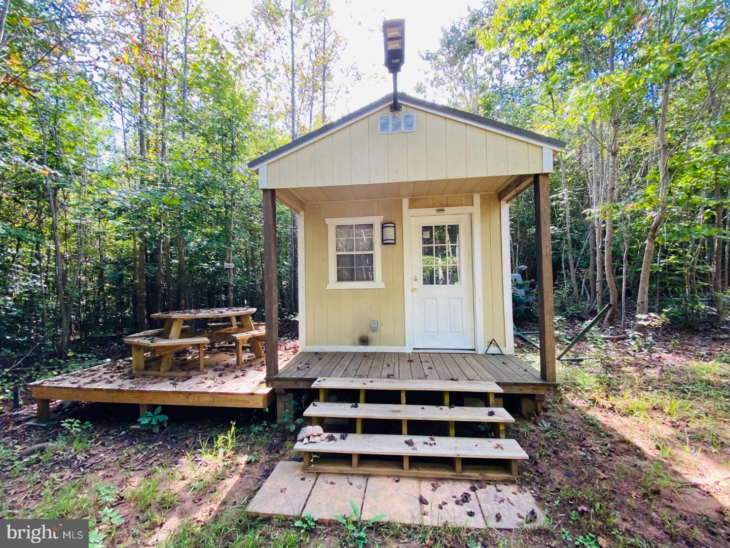 684 Squirrel Hollow Road Alberta, VA 23821 - Photo 40 of 43 Charming cabin nestled in serene woods.