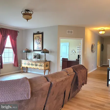 a bedroom with bed and window