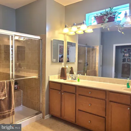 a room with cabinets and wooden floor