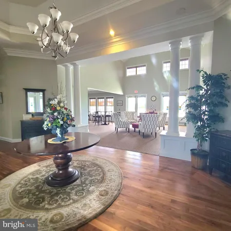 a view of a livingroom with furniture
