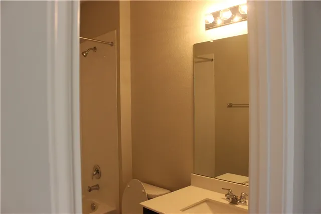 a bathroom with a sink and a toilet