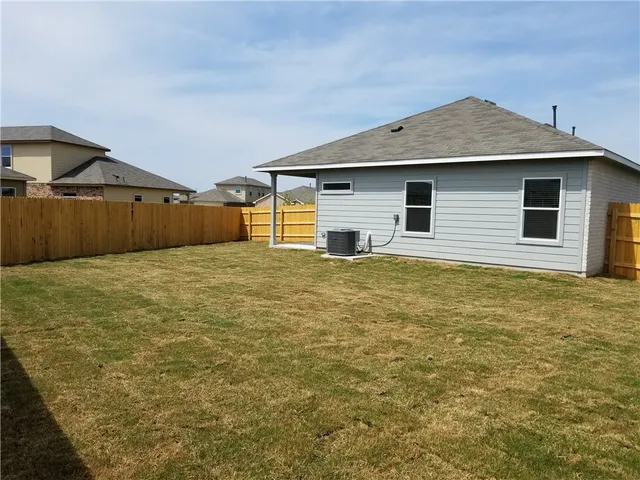 a front view of house with yard