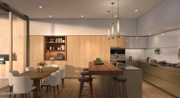a kitchen with a table chairs stove and cabinets