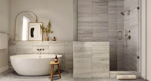 a bathroom with a bathtub and shower