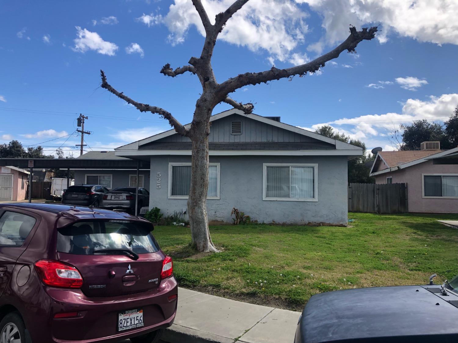 320 Brooks & Beech Lemoore Ca Lemoore, CA 93245 - Photo 11 of 21 a view of a yard in front of house