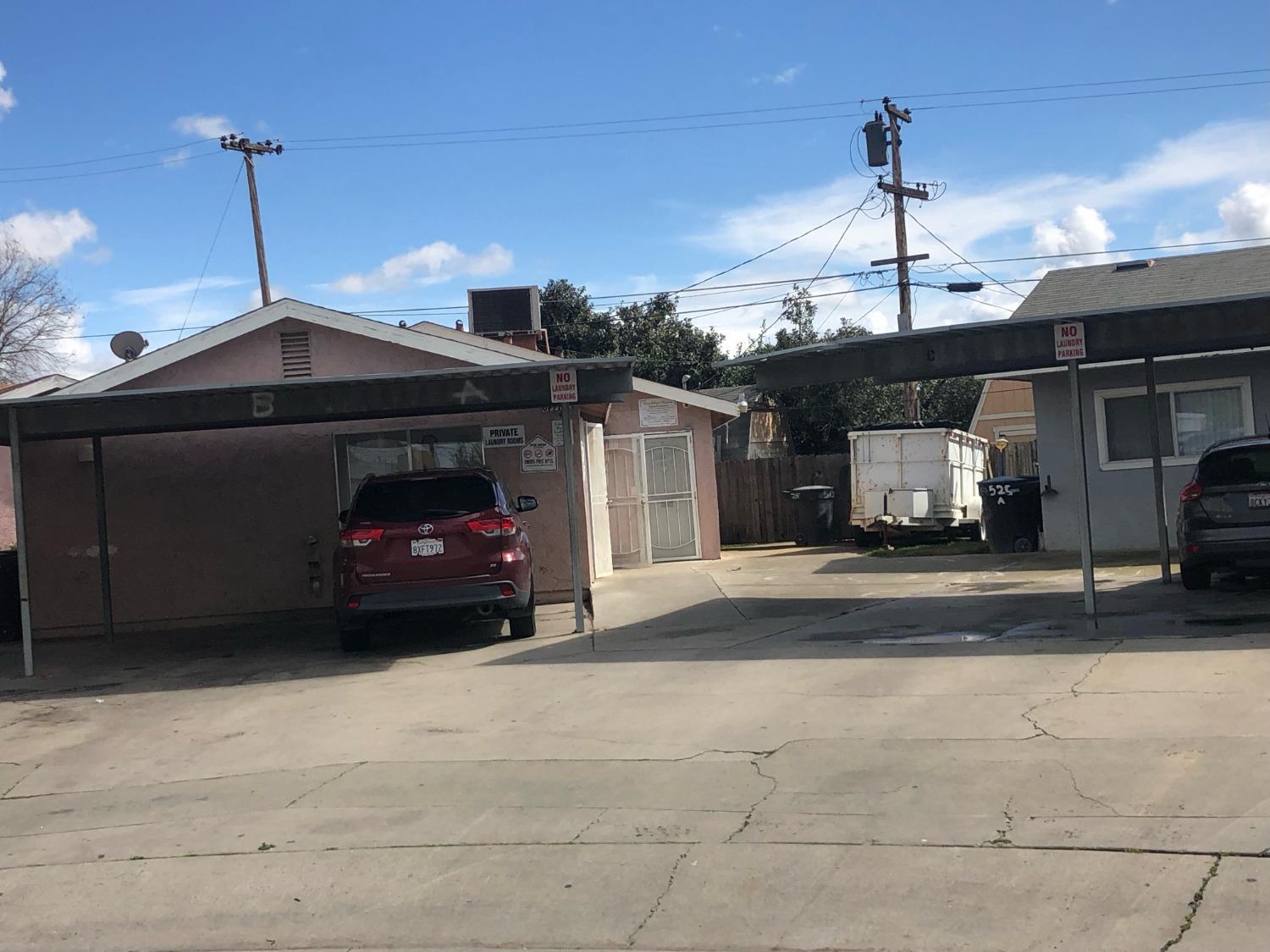 320 Brooks & Beech Lemoore Ca Lemoore, CA 93245 - Photo 12 of 21 a car parked in front of a house