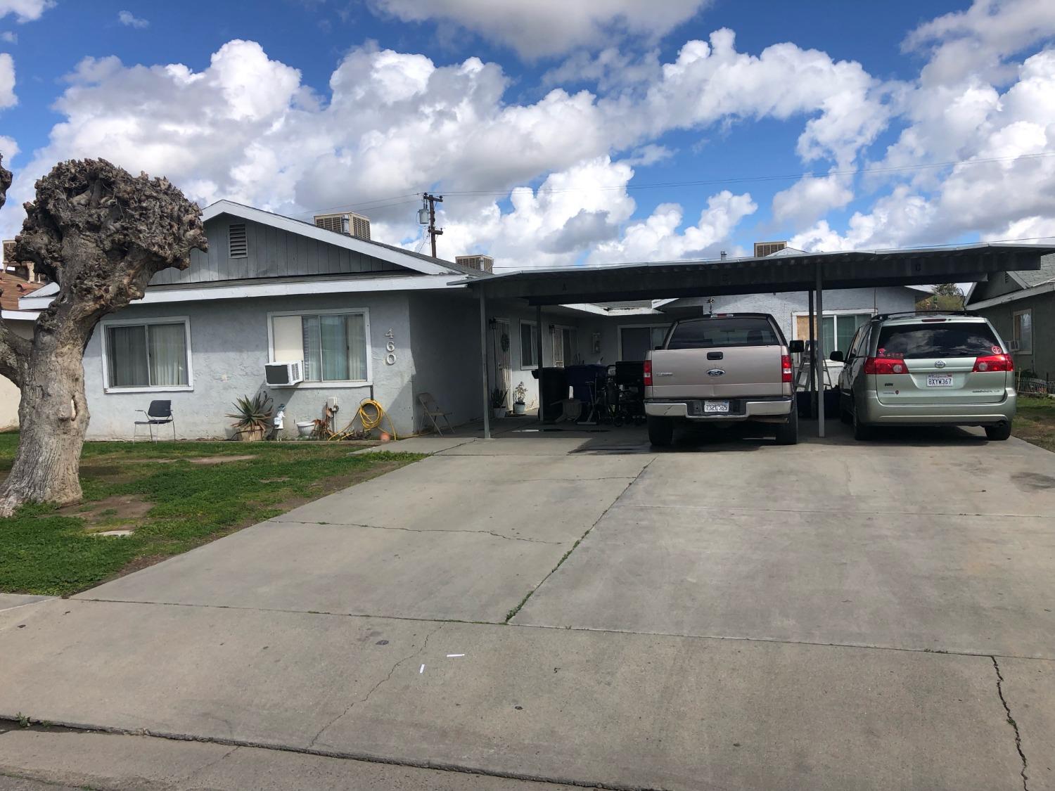 320 Brooks & Beech Lemoore Ca Lemoore, CA 93245 - Photo 17 of 21 a view of a car parked in front of a house