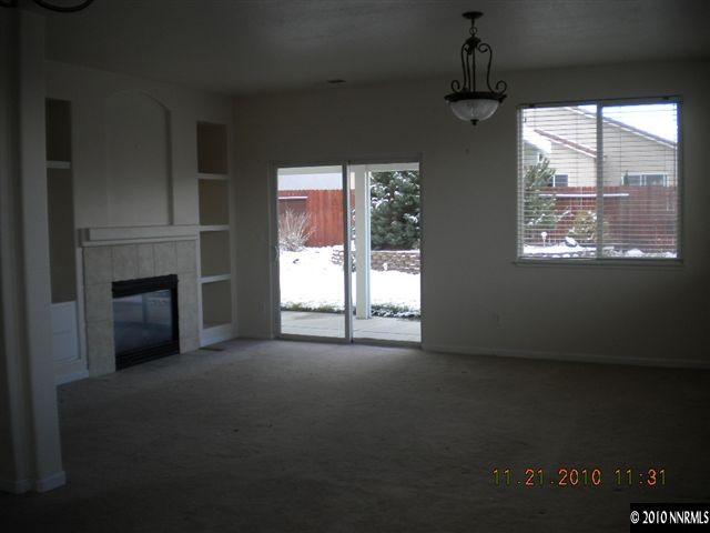 1764 Trek Trail Reno, NV 89521 - Photo 3 of 11 a view of empty room with windows