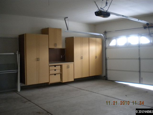 1764 Trek Trail Reno, NV 89521 - Photo 9 of 11 a view of a refrigerator in kitchen and an empty room