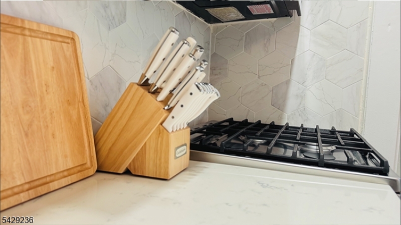 133 Summit Avenue, Unit 29 Summit, NJ 07901 - Photo 5 of 10 a close view of a stove top oven and cabinets