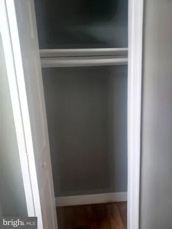 a bathroom with a toilet and a bathtub