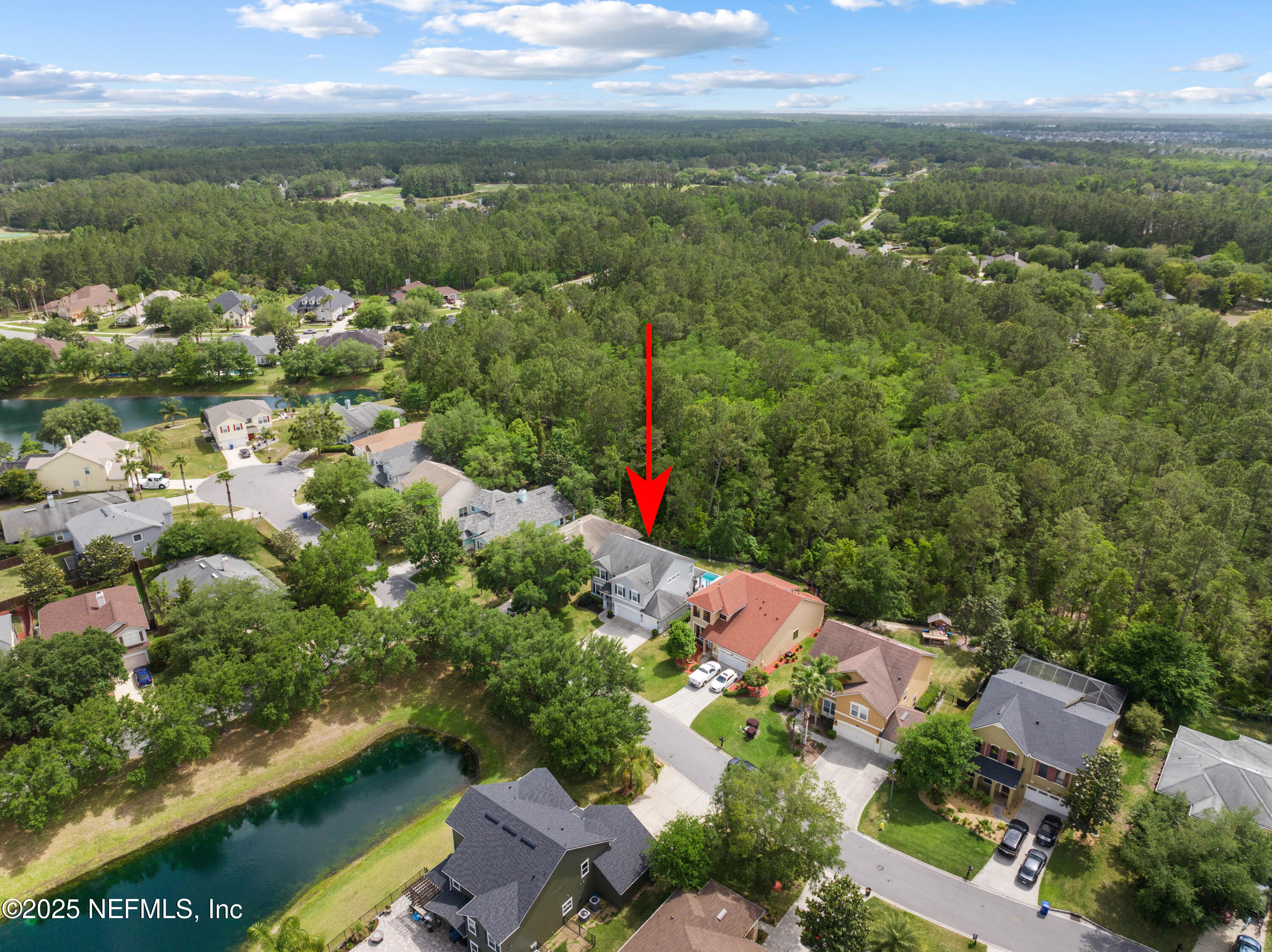 201 North Saxxon Road St. Augustine, FL 32092 - Photo 29 of 42 an aerial view of residential houses with outdoor space and river