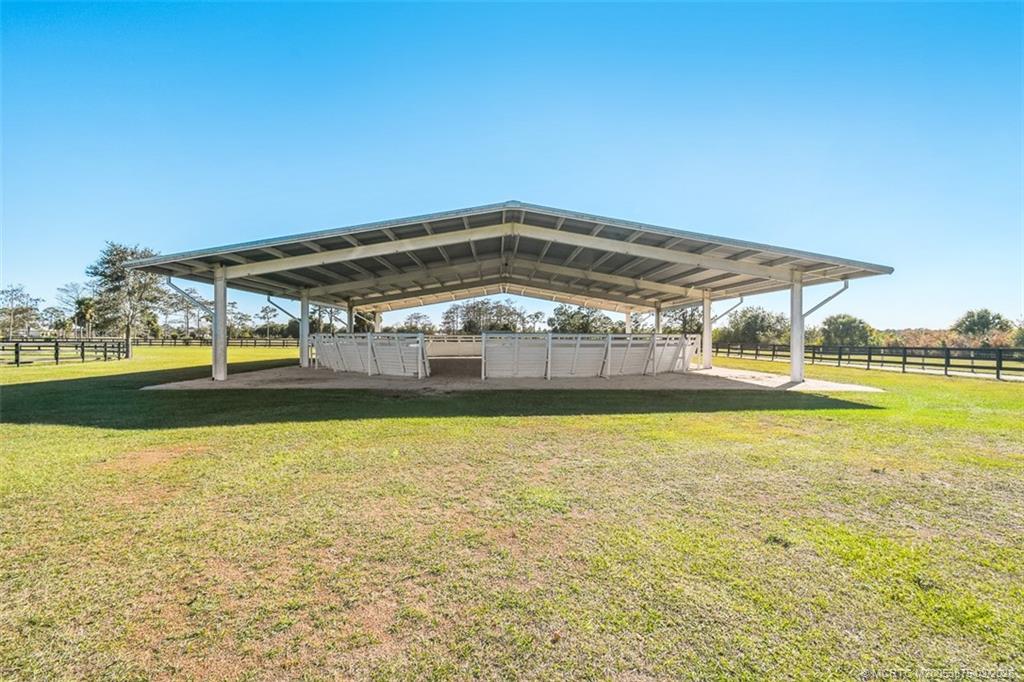 2541 Southwest Trailside Path Stuart, FL 34997 - Photo 95 of 100 a view of a swimming pool and an outdoor space