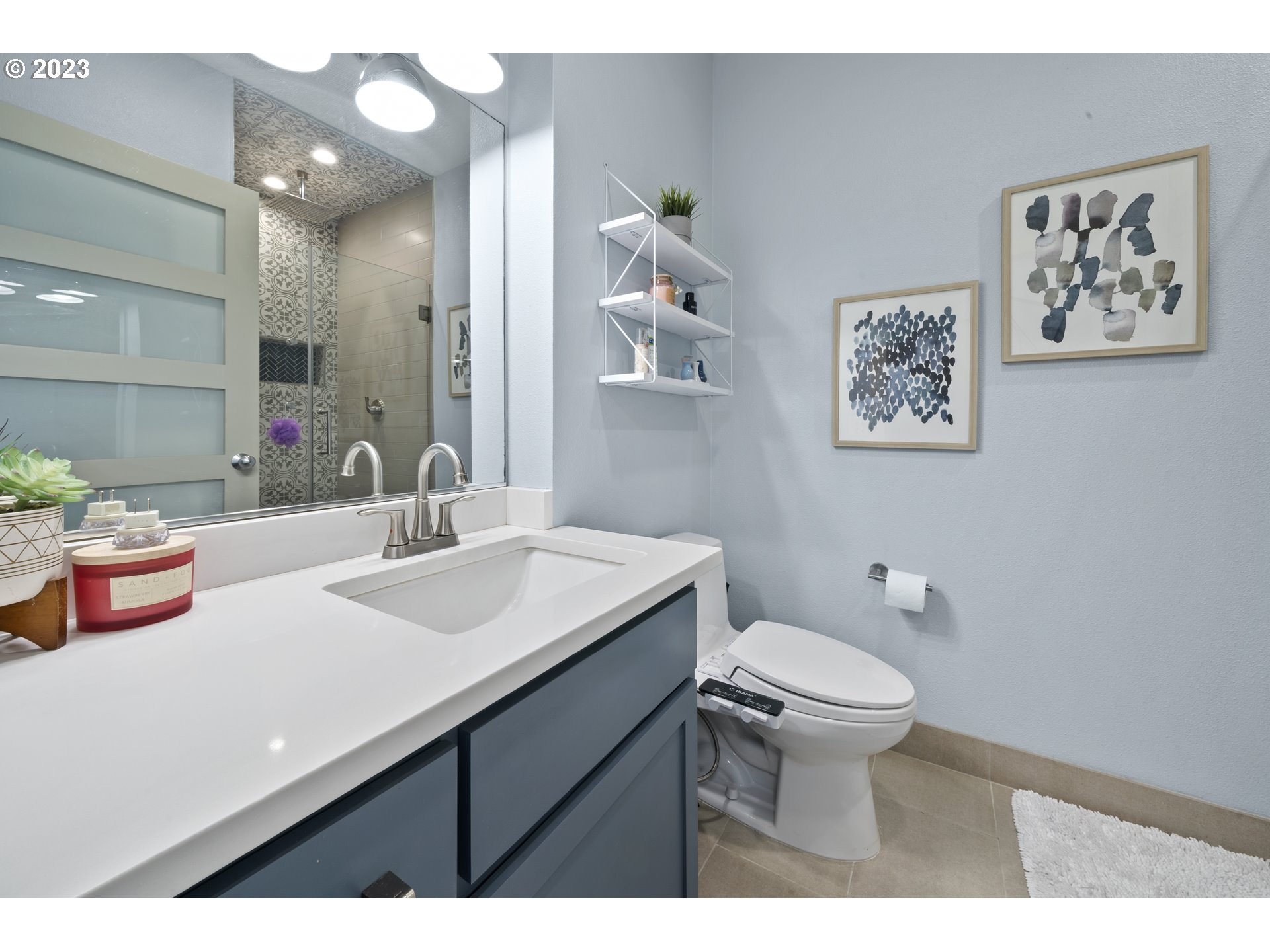 1134 Southwest Jefferson Street, Unit 405 Portland, OR 97201 - Photo 14 of 28 a bathroom with a sink and a toilet
