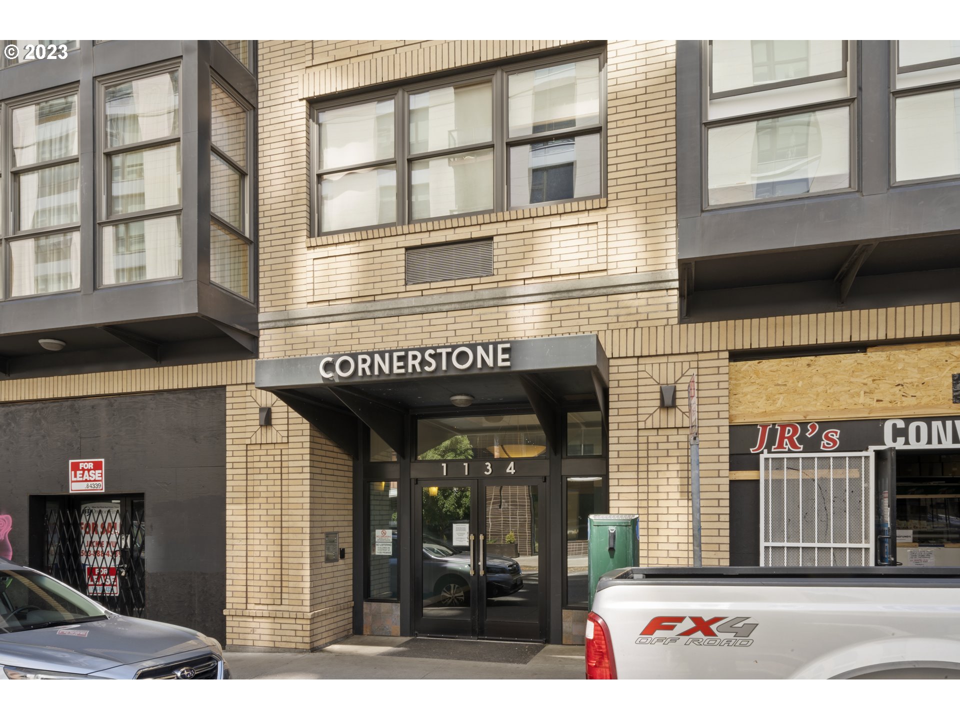 1134 Southwest Jefferson Street, Unit 405 Portland, OR 97201 - Photo 24 of 28 a front view of multi story residential apartment building