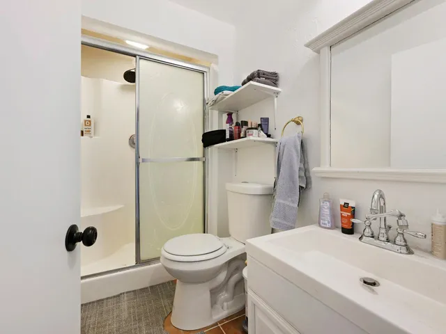 a view of a house with a back yard