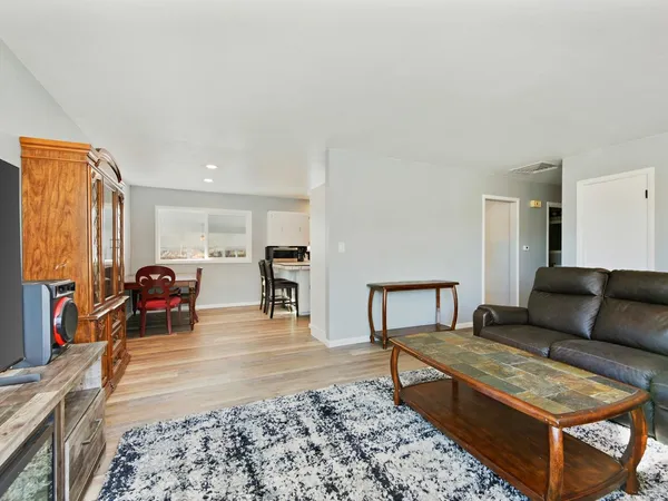 a living room with furniture and a couch