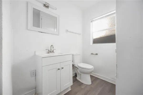 a bathroom with a sink and a toilet