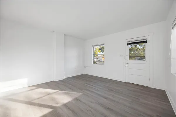 an empty room with windows