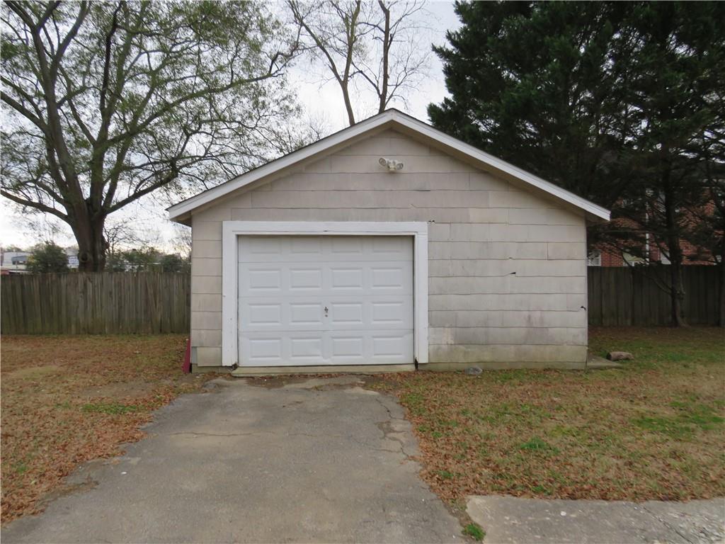 228 Marshall Street Cedartown, GA 30125 - Photo 9 of 22 a view of house with backyard and garage