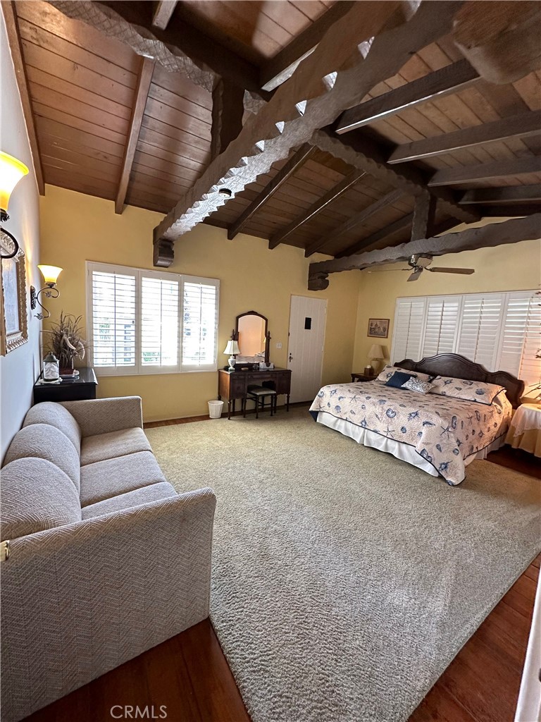 332 Encino Lane, Unit A San Clemente, CA 92672 - Photo 6 of 6 a living room with furniture and a chandelier