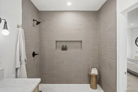 a bathroom with a sink and shower