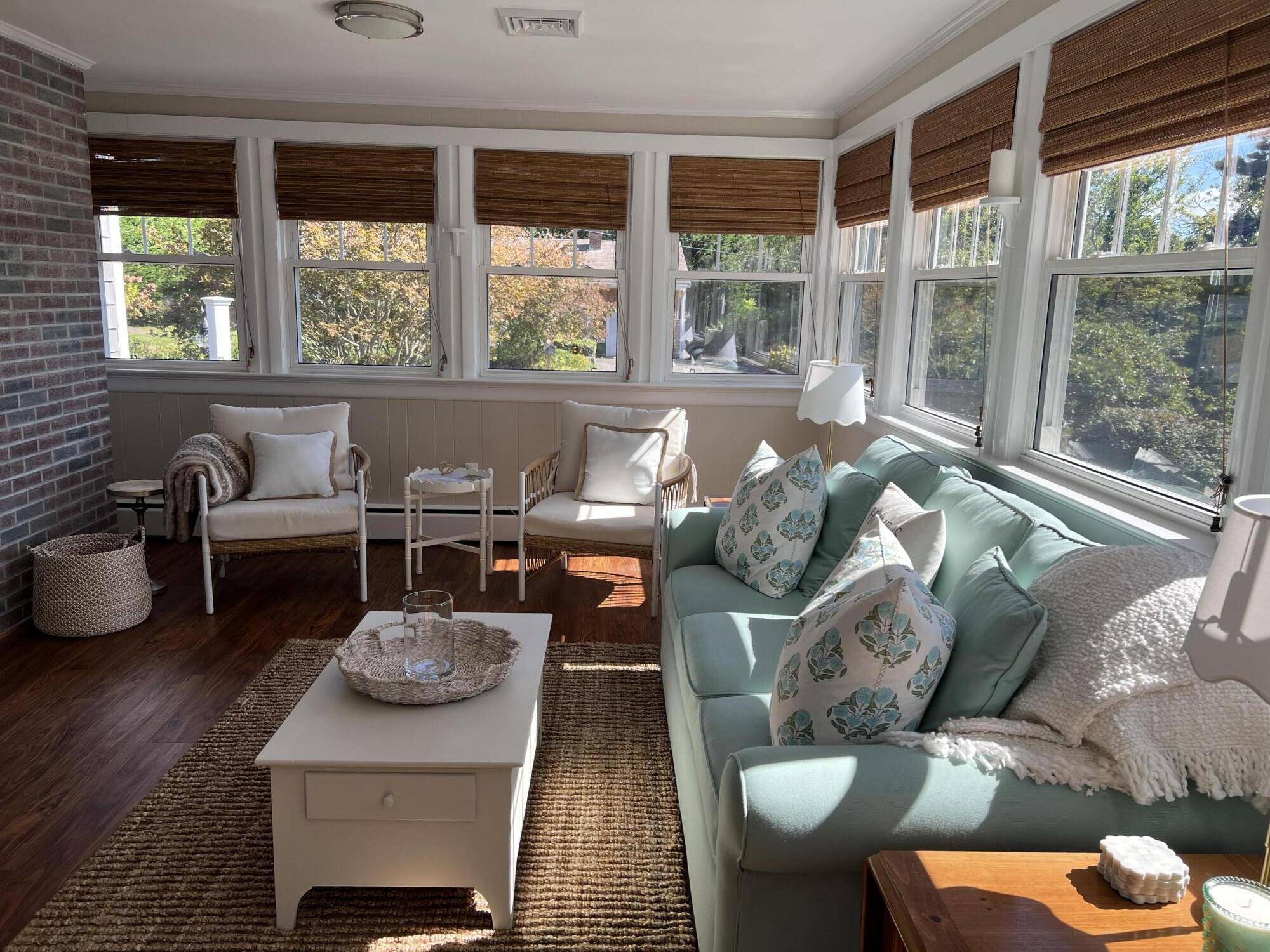 69 Joan Road Barnstable, MA 02632 - Photo 12 of 26 a living room with furniture and a large window
