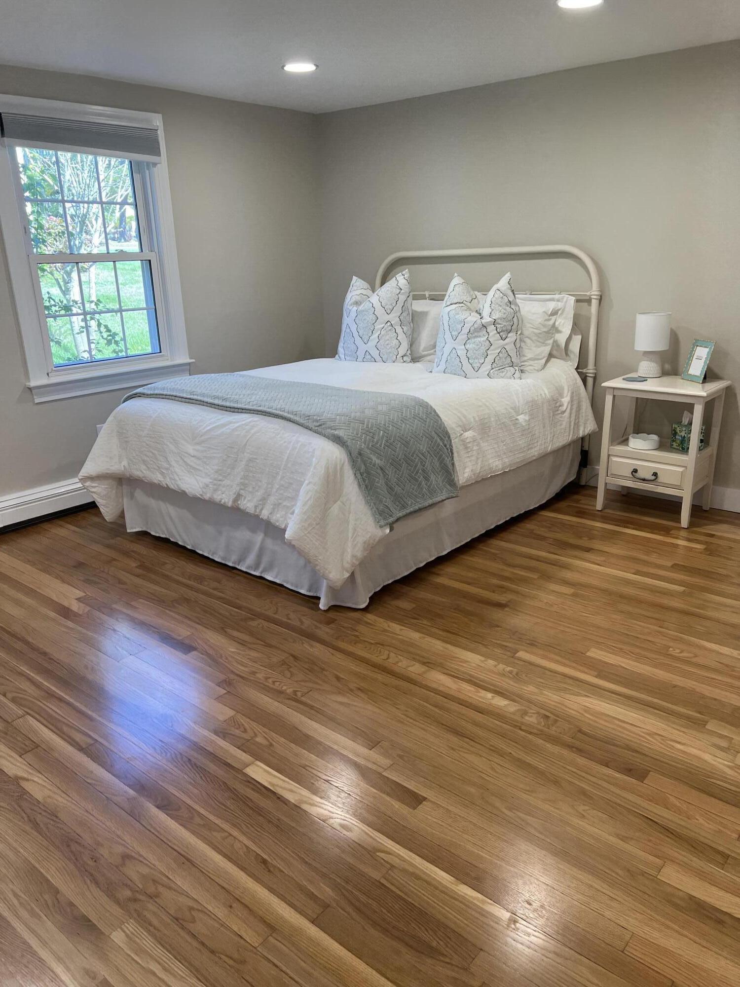 69 Joan Road Barnstable, MA 02632 - Photo 14 of 26 a bedroom with a bed and a window