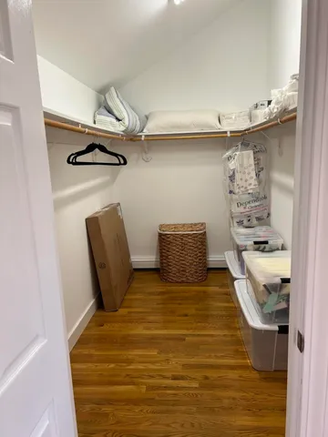 a bathroom with a tub and shower