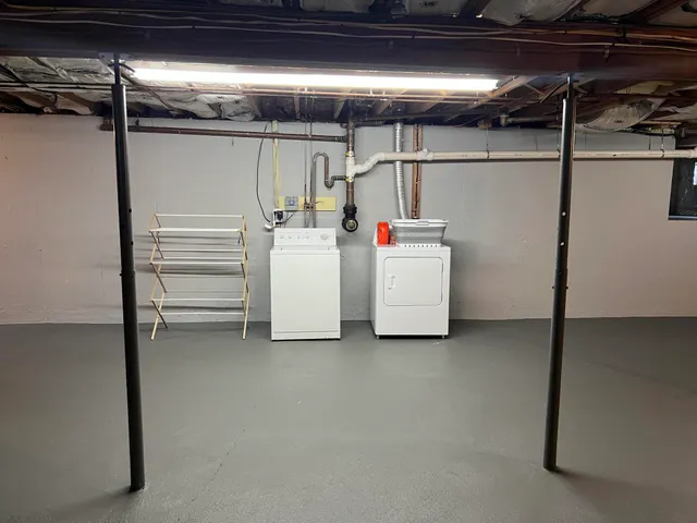 a view of storage and utility room with racks