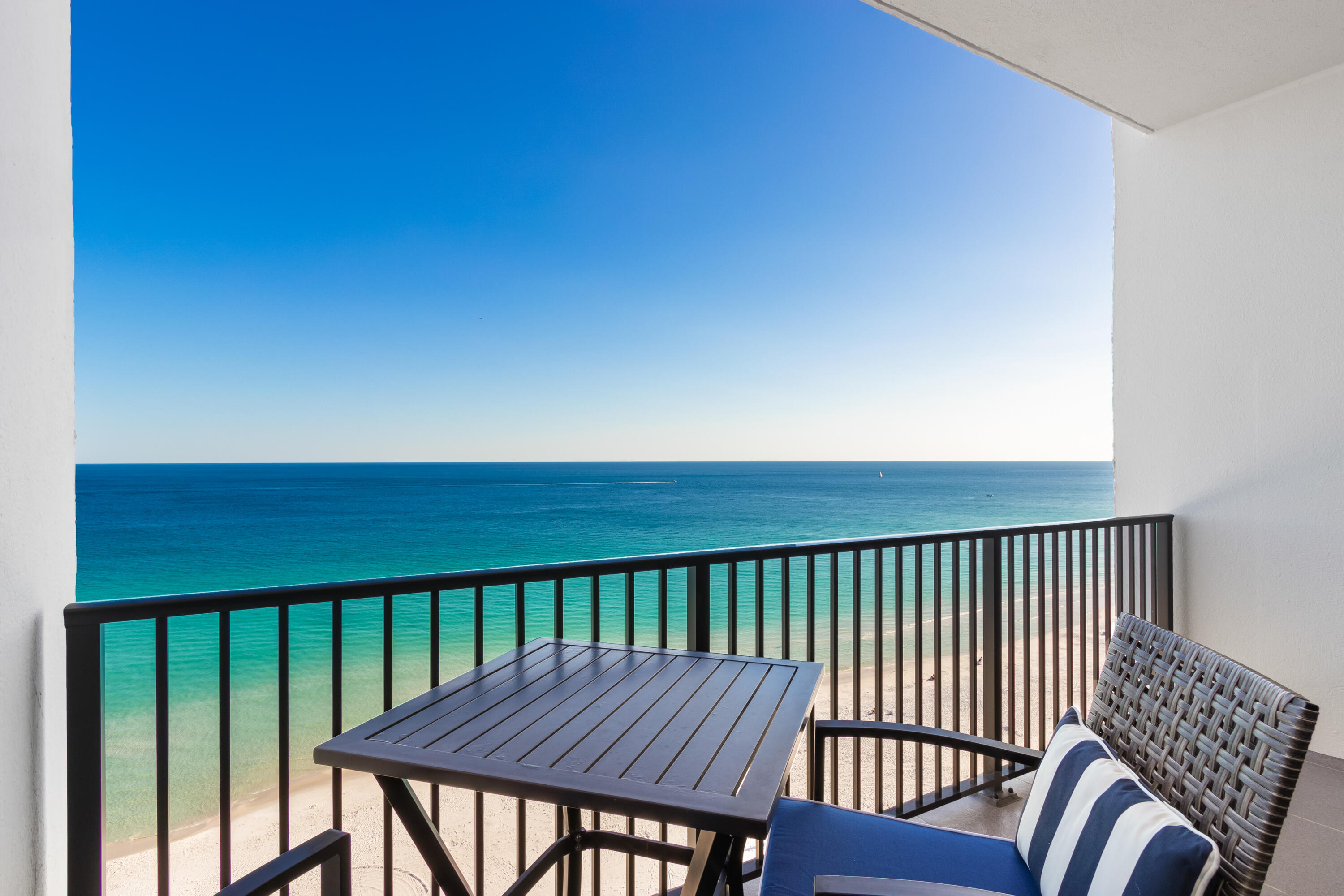 1044 Highway 98, Unit PH1403 Destin, FL 32541 - Photo 28 of 49 a view of a wooden chairs in a balcony