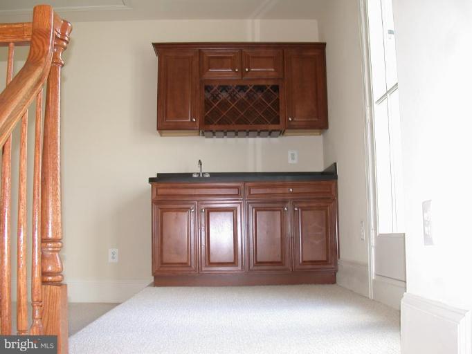 1730 Carpenter Road Alexandria, VA 22314 - Photo 8 of 20 a view of a door and a microwave