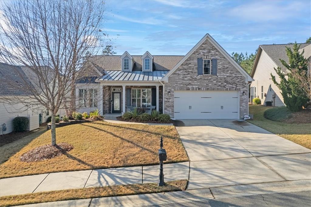 623 Hemlock Trail Canton, GA 30114 - Photo 1 of 1 a front view of a house with a yard