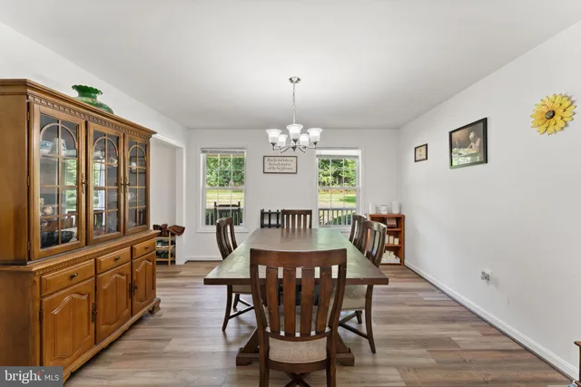a utility room with a sink dryer and washer
