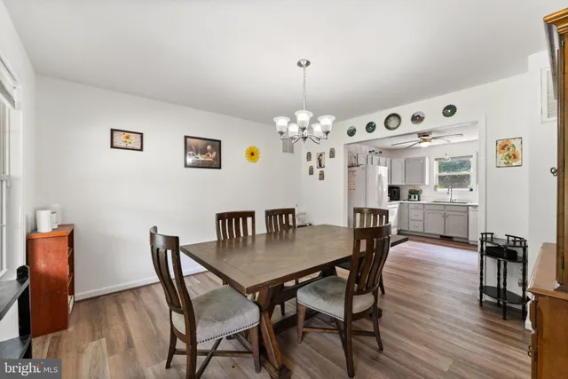 a view of a deck with wooden floor and outdoor space