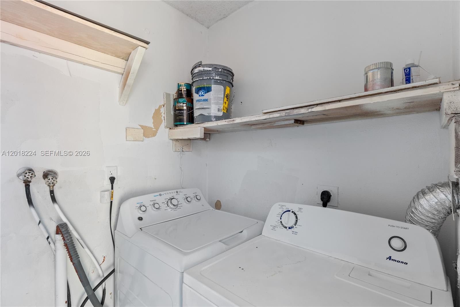 7958 Southwest 6th Street Pompano Beach, FL 33068 - Photo 33 of 57 a utility room with dryer and washer