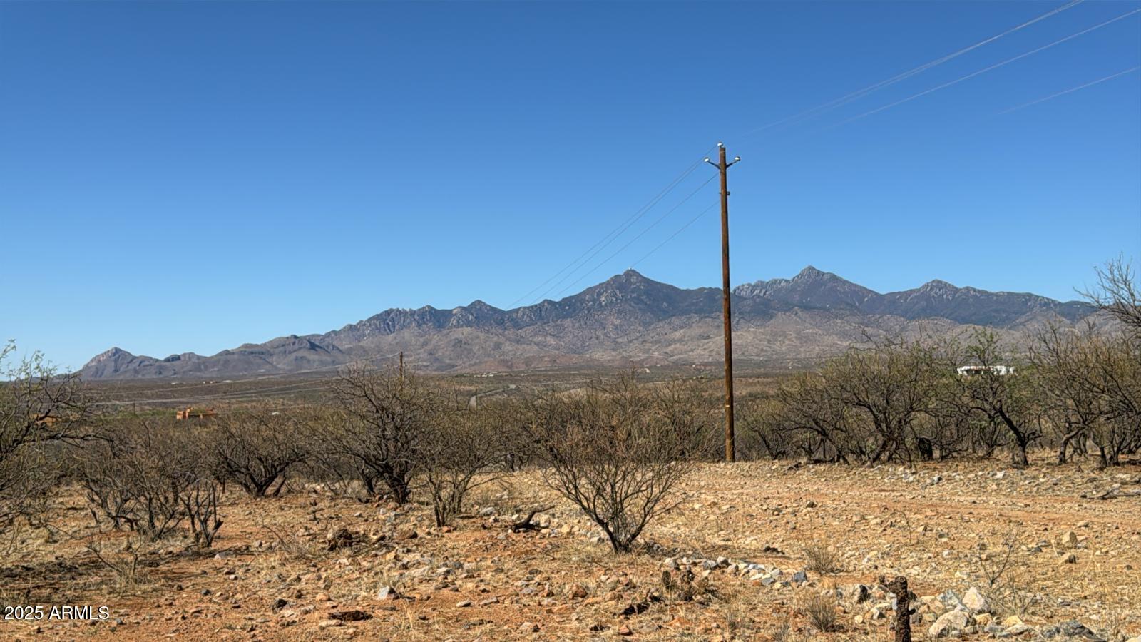 372 Calle Buzo, Unit 88 Rio Rico, AZ 85648 - Photo 2 of 4 a view of a house with a snow on the road