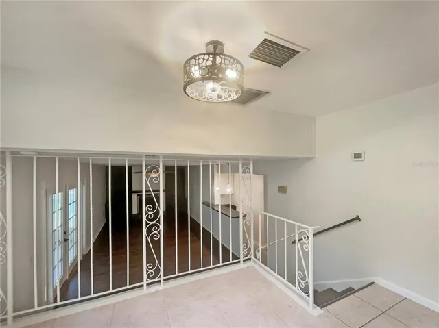 a view of a hallway with entryway