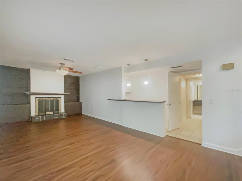 1911 Rambling Lane Brandon, FL 33510 - Photo 12 of 29 a view of a kitchen with a sink and a refrigerator