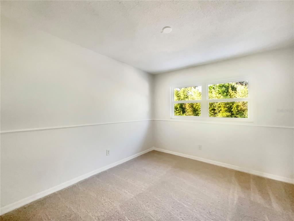1911 Rambling Lane Brandon, FL 33510 - Photo 23 of 29 an empty room with windows